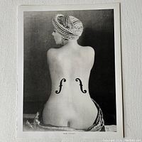 Black and white photographic print titled 'Violin d'Ingres' featuring a nude female back with violin f-holes.