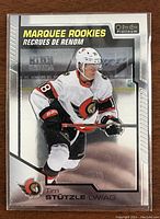 Front of Tim Stutzle OPC Platinum Marquee Rookies rookie card showing player skating in Ottawa Senators uniform with card branding and numbering.
