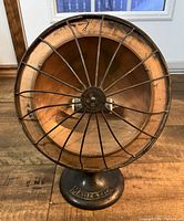 Front view of the parabolic reflector and protective metal wire grid.