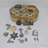 Overview of all items displayed in front of the wood jewelry box on white background