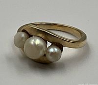 Front view of ring showing three pearls