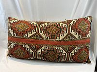 Full front view of pillow showing overall geometric pattern