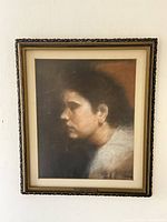 Full view of framed pastel portrait showing composition, frame and mat