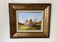 Full view of framed oil painting depicting Quebec country house scene