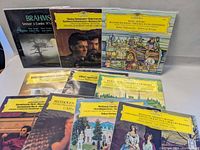 10 classical vinyl albums displayed on a surface showing album covers and classical artwork.