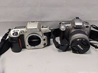 Two Nikon SLR cameras including N55 with lens and N60 body only