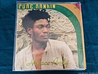 Front album cover showing Horace Andy and the title 'Pure Rankin' with green/yellow design.