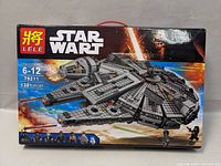 Box front showing LELE Star Wart spaceship model kit with 1381 pieces for ages 6-12.