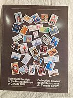 Photo of souvenir collection album cover showing featured Canadian stamps from 1976 including various designs and denominations.