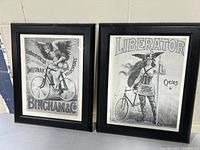 Pair of framed Bingham & Liberator bicycle advertising posters standing side by side, black and white vintage-style illustrations.