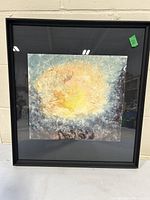 Framed abstract oil painting by Endel Ruberg showing a central bright yellow-orange area with surrounding blues and greys and natural frost pattern textures.
