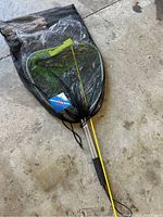 Full lobster catching kit in black mesh bag with tag visible