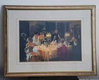 Framed double matted print showing a group dining scene in warm colors by Jules-Alexandre Grun.