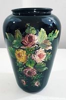 Full view of the black amethyst glass vase with floral hand painted design