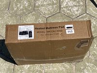 Cardboard box showing label for Heated Mattress Pad model MK-CALI KING, size 72x84 inches (Cal King).