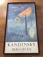 Front view of framed poster showing full composition