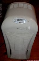 Front top view showing electronic control panel and vented front grill.