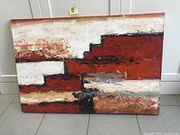 Front view of original abstract oil painting showing the overall composition of stepped red shapes with white and brown background.