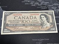 Front of banknote showing Queen Elizabeth II portrait, denomination and serial number