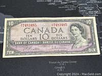 Front view of the 1954 Canadian 10 dollar banknote, showing the full note including serial numbers, Queen Elizabeth II portrait, and signatures.
