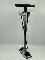 Front view of the Bontrager Super Charger bicycle tire pump standing upright on its base with black footpads and handle.
