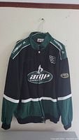Full frontal view of the black and green Nascar Earnhardt Jr. bomber jacket showing AMP Energy logo and number 88 on the chest.