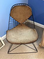 Front view of entire chair with wire frame and cushion