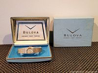 Vintage Bulova Accutron ladies wristwatch in original blue and white velvet-lined box with outer box.