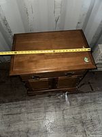 Top view of the cabinet showing width of approximately 25 inches.