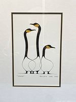 Front view of framed 'Friends' print showing entire artwork and frame in front of white background.