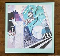 Full framed lithograph showing the abstract colored composition with green mat and brown frame.