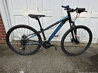 Side-profile view of entire bike frame, drivetrain, wheels and components