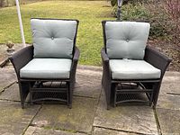Pair of chairs front view on stone patio