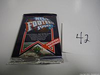 Front view of unopened 1991 Upper Deck NFL Football trading card pack with visible branding and Premiere Edition logo.