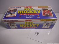 Front view of the sealed 1990 Score NHL Hockey Premier Edition box indicating 445 player cards included.