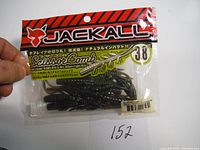Full view of Jackall 3.8 inch Scissor Comb fishing baits package with clear front showing soft plastic baits inside.