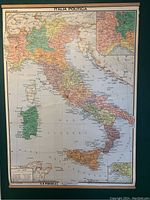 Front view of the hanging map showing Italy's political regions with clear color distinctions and city names.