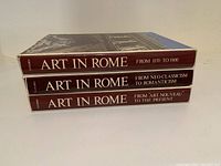 Spine view of the three Art in Rome hardcover books showing titles and volume periods