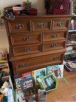 Front view showing seven drawers with metal bail handles