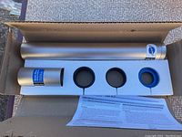 Opened box showing Park Tool crown race setting system components arranged in foam insert with instruction sheet underneath.