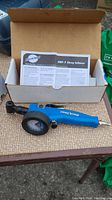 Overview of Park Tool INF-1 Shop Inflator in opened box with instruction manual visible