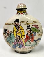 Front view showing colorful hand painted traditional Chinese figures on porcelain snuff bottle