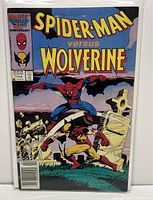 Front cover photo showing the full cover art of Spider-Man versus Wolverine #1 with price and issue date visible.