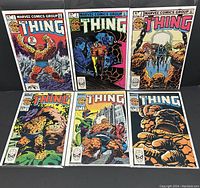 Photo of six Marvel The Thing comic books, issues #1 to #6, front covers visible, displayed in two rows. Each comic is bagged and boarded.
