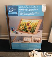 Box of Artist's Loft All Media Flat Surface Easel showing product image and dimensions.