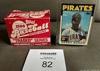 Photo of the 1986 Topps Baseball Traded Series factory box and Barry Bonds rookie card to illustrate the box condition and highlight key rookie card included