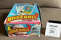 Partial opened 1989 Topps Baseball Card box showing handling wear and missing paper flap.