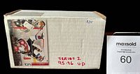 Closed box labeled 'Series 2 95-96 UP' with hockey player images on side, showing packaging for the complete set of cards.