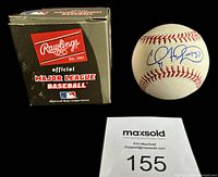 Photo of Rawlings official Major League Baseball box next to Cliff Floyd autographed baseball and lot number card.