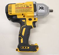 Side profile showing DeWalt impact wrench body, handle and gear housing